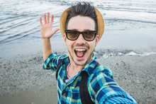 Handsome Caucasian Man Take A Selfie At The Beach - People, Lifestyle, Nature And Technology Concept