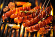Sausages on the barbecue grill with flames