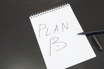 Plan B,A written on a blank notepad