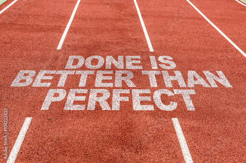 Fotografía Done is Better than Perfect written on running track