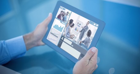 Poster - Composite image of businessman using his tablet 
