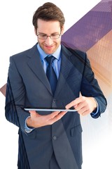 Wall Mural - Composite image of businessman standing while using a tablet pc