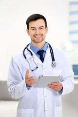 Poster - Doctor with tablet in office