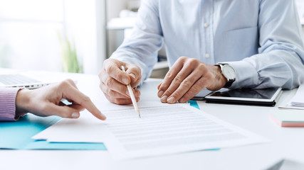 business people negotiating a contract