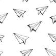 Seamless pattern with a paper airplane.
