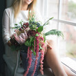 © cherry_d - Florist at work: pretty young blond woman holds fashion modern bouquet of different flowers