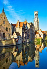 Brugge architecture among the canal reflected in water, Vertical view of Belgium