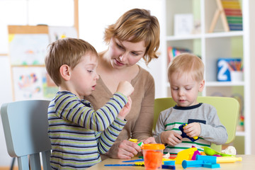 Mother and kids have a fun at home