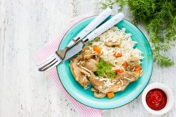 Wall Mural - Rabbit stew with carrot and mushroom with a side dish of basmati