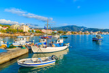 Fototapeta  - Greek fishing boats at sunrise in small port, Samos island, Greece
