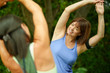 © AYAimages - Two mature women keeping fit and streching before jogging