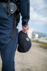  Detail of a police officer. Selective focus with shallow depth of field.