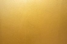 Gold Concrete Wall On Background Texture.