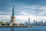 Fototapeta  - The statue of Liberty and Manhattan, New York City