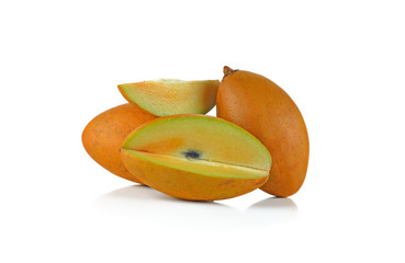 fresh sapodilla fruits on white background