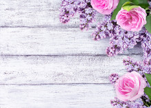 Lilac Flowers With Roses On Background Of Shabby Wooden Planks