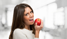 Girl Eating A Red Apple