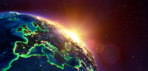 Wall Mural - europe at golden sunrise - view from space