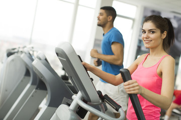 Wall Mural - Young multiracial people training in the gym