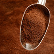 Ground coffee in a scoop