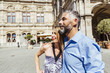 © Westend61 - Austria, Vienna, smiling couple in front of state opera