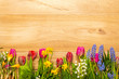 © abasler - Blank space on wooden background with spring flowers