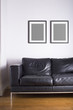 Two black picture frames on wall