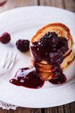 Fototapeta Mapy - Pancakes with BlackBerry jam.selective focus.