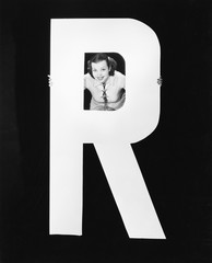 Canvas Print - Woman with huge letter R 