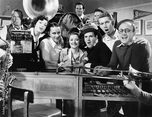 Group of young musicians performing in a music store Poster