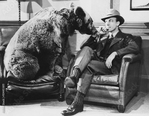 Thoughtful man with bear