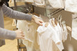 © Monet - Mothers are choosing baby clothes in the shop