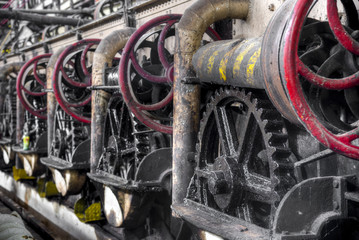 Wall Mural - Gear wheels in colonial sugar factory in Gondang Baru, Java, Indonesia