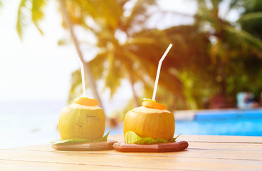 Wall Mural - two coconut drinks served in luxury resort