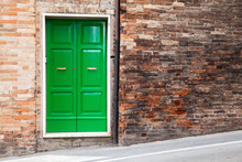  Green Wooden Door In Old Brick Wall