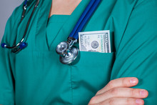 Doctor's Scrub Top With Stethoscope And One Hundred Dollar Bill.