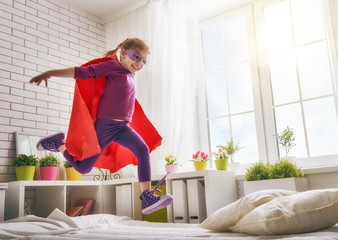Wall Mural - girl in an Superman's costume