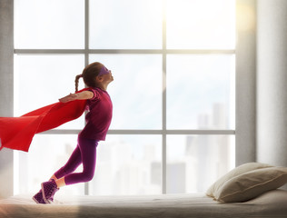 Wall Mural - girl in an Superman's costume