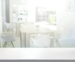© nuttapol - Table Top And Blur Interior of Background