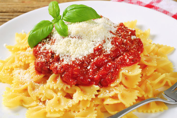 Canvas Print - Pasta farfalle with tomato sauce and cheese