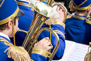 Canvas Print - musician with brass tuba at street concert