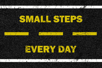 Small steps every day word on the road background