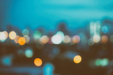abstract background with bokeh defocused lights and shadow from cityscape at night, vintage or retro