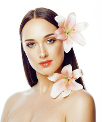 Wall Mural - young attractive lady close up with hands on face isolated flower lily brunette spa nude makeup