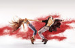© konradbak - Talented young dancers sprinkling red dust