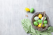 Colorful easter eggs in basket