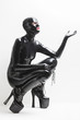 © Richard Semik - sitting woman wearing latex clothes