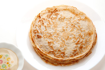 Wall Mural - Pancakes with syrup. Pancake Day. Shrovetide.