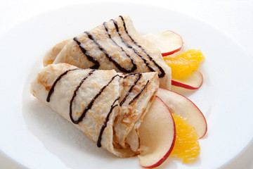 Wall Mural - Pancakes with fruit and syrup. Pancake Day. Shrovetide.