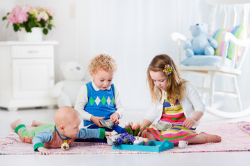 Wall Mural - Children playing toy tea party